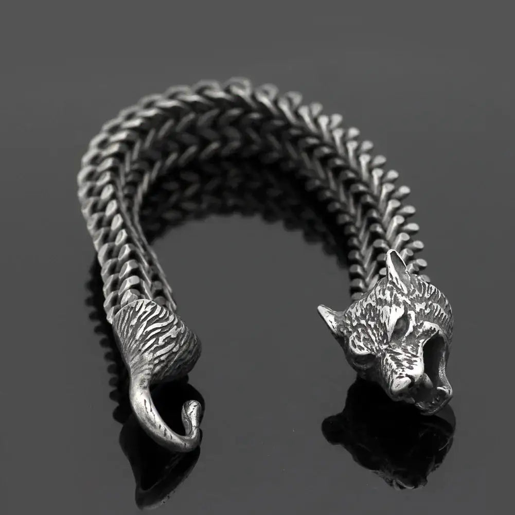 Men’s Wolf Head Bracelet made of stainless steel with a Cuban chain design, symbolizing power and strength.