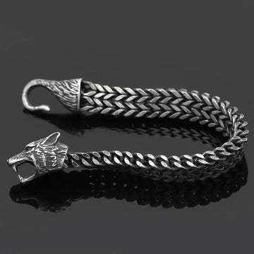 Men’s Wolf Head Bracelet showcased with a stainless steel Cuban chain design, symbolizing power and strength.