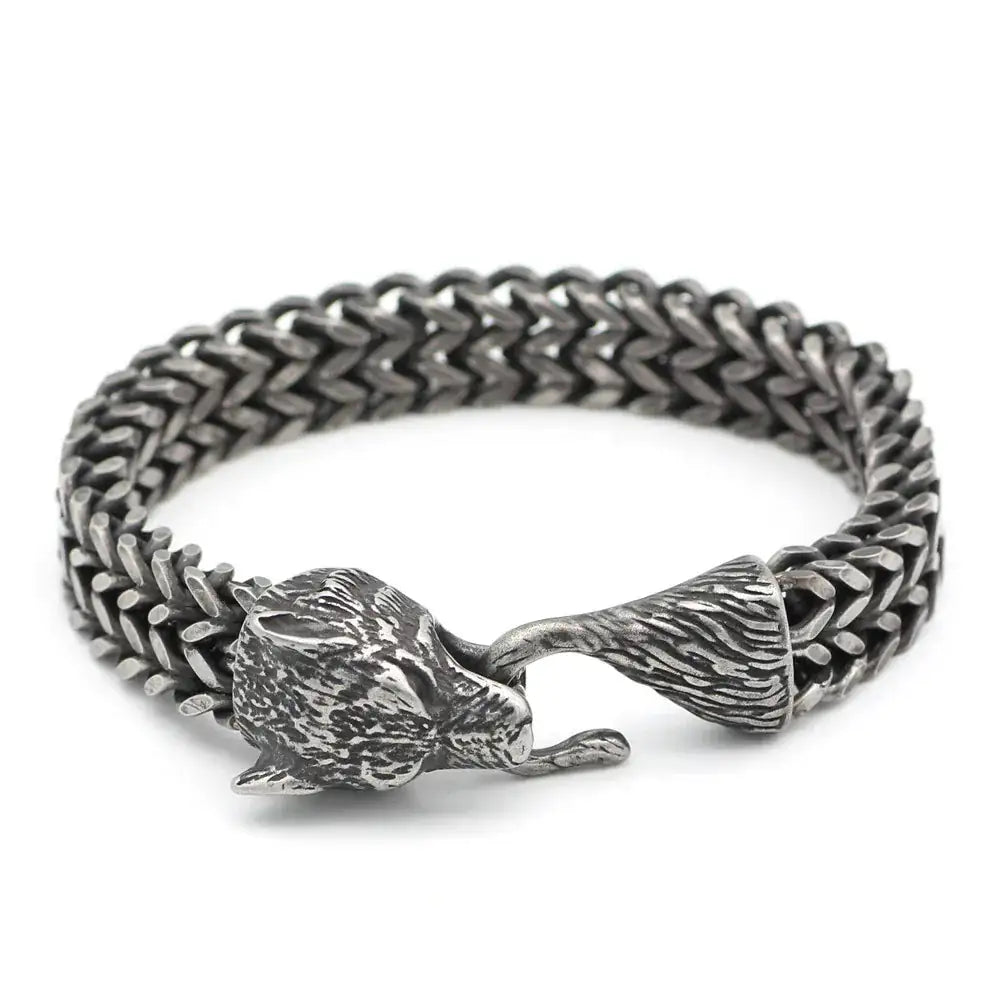 Men’s Wolf Head Bracelet showcasing a stainless steel Cuban chain with intricate wolf head detailing.
