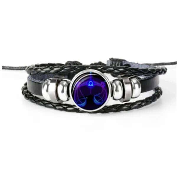 Luminous Zodiac Bracelet showcasing a glow in the dark astrology design with intricate braided leather and silver accents.