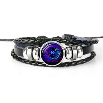 Luminous Zodiac Bracelet – Glow in the Dark Astrology Bracelet with braided design and circular zodiac emblem.