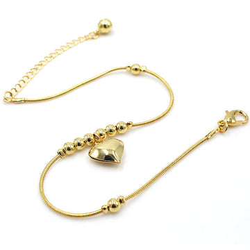 Chunky heart anklet worn on an ankle